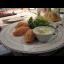 Salmon tartar in restaurant Caviar House